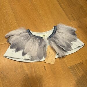 Brand new indigo blue feather cape. Never worn. Absolutely beautiful